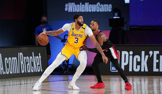 De la mano (triplera) de Damian Lillard, Blazers qued� al frente